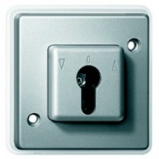 Interrupteur poussoir IP44 2 pôles 10A à clé volet roulant